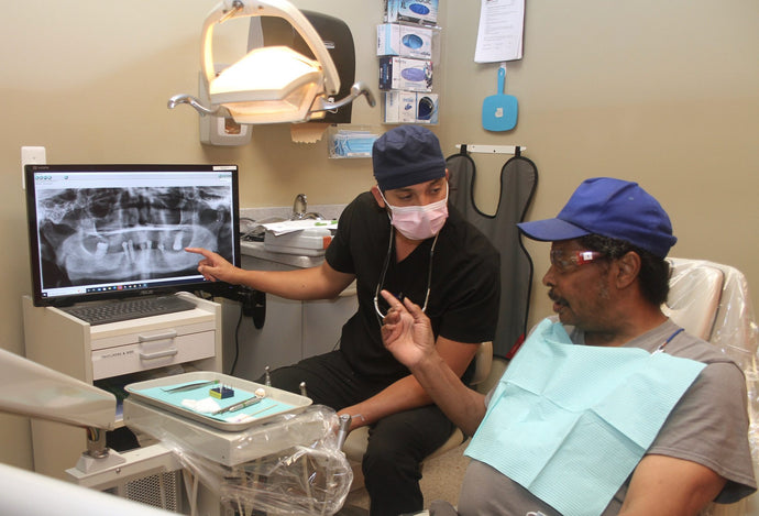 Dental school’s Victors for Veterans Program expands its free care for Michigan veterans